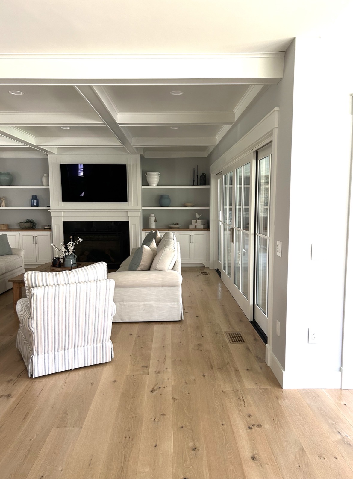 Character grade white oak flooring with natural color variation in a living room